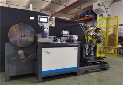 Máquina enroladora de núcleo toroidal semiautomática