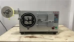 Máquina de embrulhar fitas indutoras